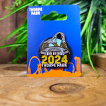 A round pin badge with 2024 Thorpe Park at the bottom in yellow glitter, with the outline of Hyperia at the top and the Dome in the middle.