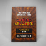 A portrait orientated sign which has a sunburst background. In the middle is 'The Big Top Showtime' logo, and underneath is a Fear Rating of three skulls, and an arrow for a safe route to avoid the attraction.