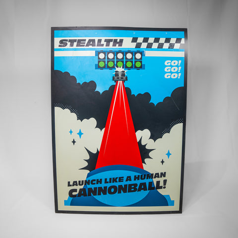 A portrait orientated poster showing Stealth launching out of a cannon. It is blue with a red streak where Stealth is.