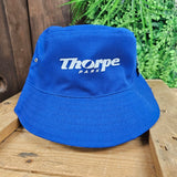 The flipped bucket hat, solid blue with a single white Thorpe Park logo