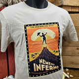 A t-shirt showing the artwork print. The base colour for the t-shirt is a light sandy colour, and the print is black and orange showing a lady tightrope walking over a volcano