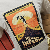 A close up of the print, it is black at the bottom in a volcano shape, and orange and yellow at the top. The words Nemesis Inferno are in the volcano
