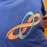 A closer view of the embroidered logo, the horizontal logo is orange and the loop behind is light blue