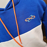 A closer view of the embroidered logo on the chest, it is around 3cm across, and is orange and blue.