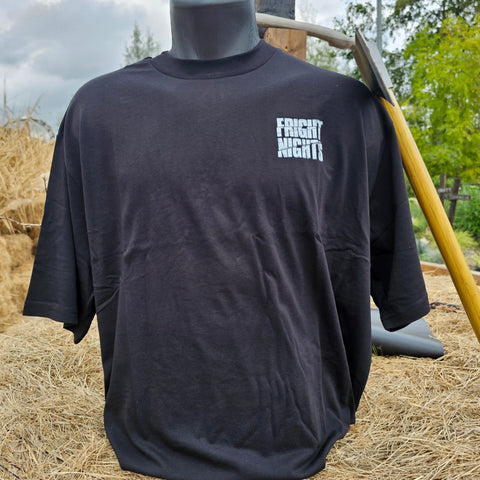 A black, oversized fit t-shirt with the Fright Nights logo printed on the chest pocket