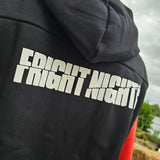 A closer view of the printed white Fright Nights logo on the black body of the hoody