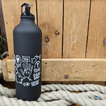 A black metal bottle with a screw top, and white runes printed in the middle