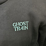 A close up view of the embroidered Ghost Train logo