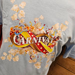 A closer look at the popcorn image, the base t-shirt is powder blue, and the Carnival logo is red and yelllow