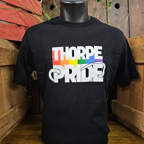 A black t-shirt with the Thorpe Pride logo printed in the middle