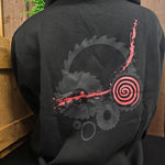 The print on the back of the hoody, a collection of saw blades, spirals and blood splashes