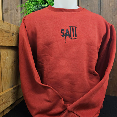 A red sweatshirt, with a black logo embroidered in the middle of the chest