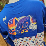A photo of the back of the top showing the rides artwork