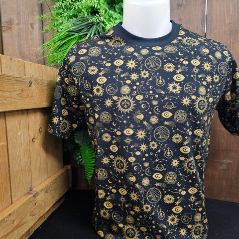 A navy blue t-shirt with a gold cosmic print all over it