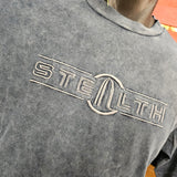 A close up photograph of the embroidered stealth logo