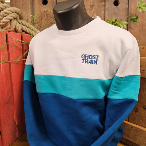 A three tone sweatshirt, the top is white and features a light blue Ghost Train logo embroidered on, the middle stripe is a teal and the base is royal blue