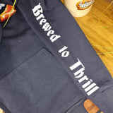The 'brewed to thrill' slogan printed on the arm of the hoody