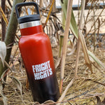 A photograph of the metal bottle. It fades from red at the top to black at the bottom. There is a white Fright Nights logo in the middle of the bottle.