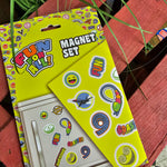 A photograph of the magnet set packaging, it's a yellow rectangle with the Fun For All symbols and images of the contents inside.