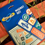 A photo of the packaging for Varsity magnet set, it's a blue rectangle with an image of a fridge with the magnets stuck on it at the bottom.